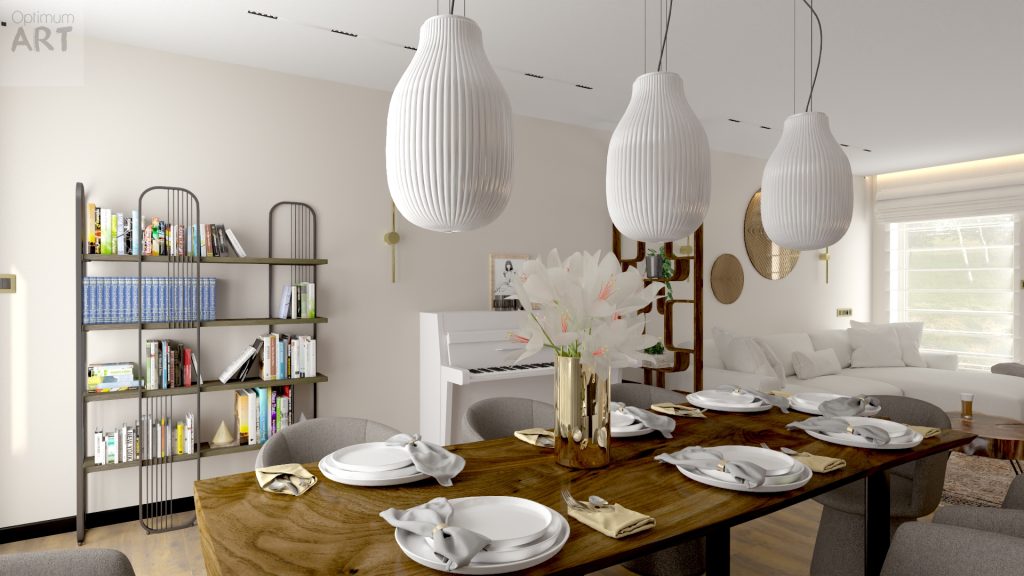 Nowoczesne wnętrze salonu z jadalnią, gdzie nad drewnianym stołem zastawionym białą zastawą wiszą trzy duże białe lampy wiszące. Po lewej stronie znajduje się regał z książkami, a w tle widać jasną sofę i okno wpuszczające naturalne światło.