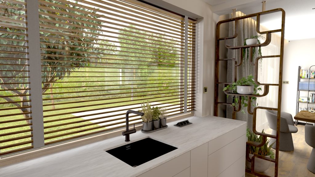 Nowoczesna kuchnia z białą wyspą kuchenną, czarnym zlewem i kranem, przy dużym oknie z drewnianymi żaluzjami. Po prawej stronie znajduje się stylowy regał z roślinami i dekoracjami.
