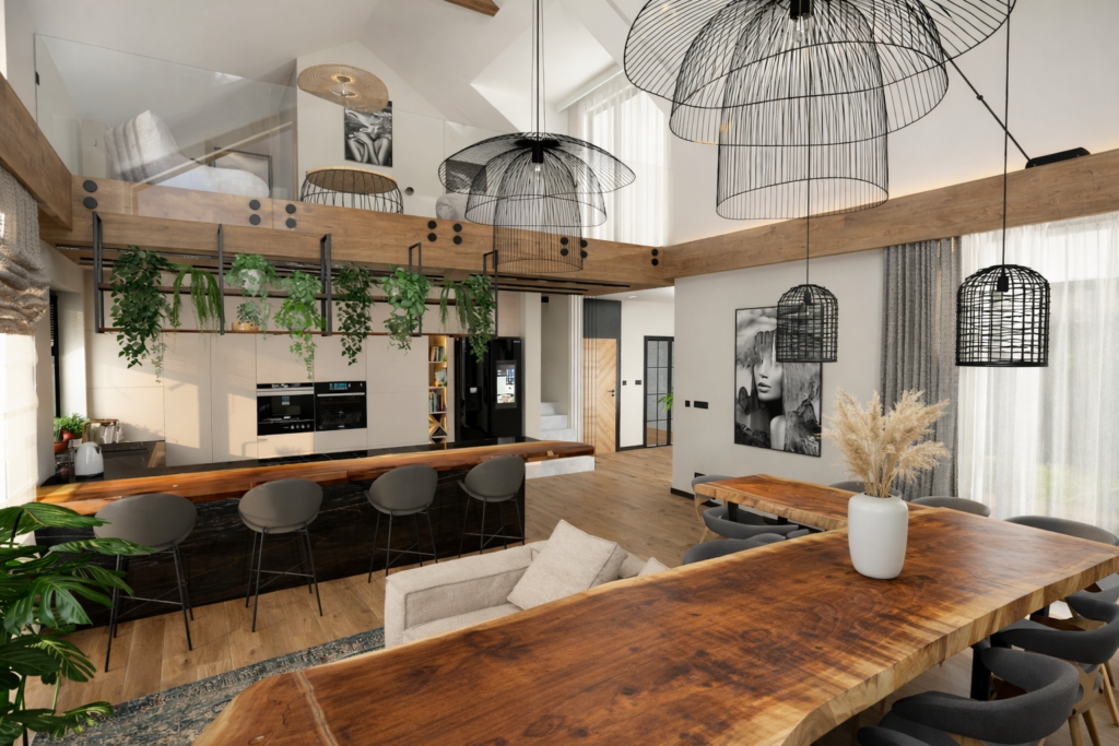 Nowoczesne wnętrze otwartej kuchni z salonem, z dużym drewnianym stołem na pierwszym planie i wyspą kuchenną z hokerami w tle. Przestrzeń ozdobiona licznymi czarnymi lampami w kształcie klatek ptasich i roślinami.